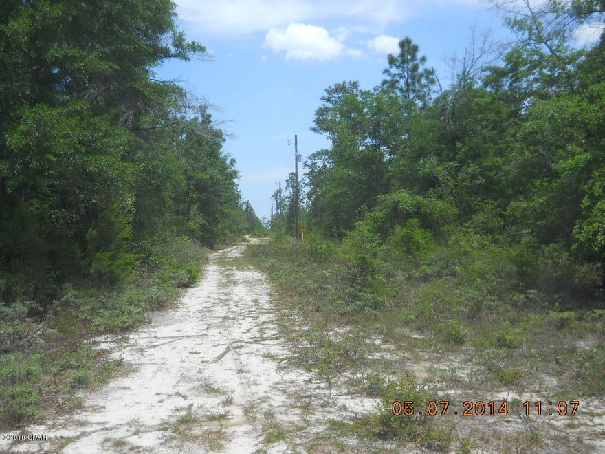 2.1 Acres Near Econfina Creek just south of Highway 20.  Level, wooded property.  Seller will consider a lease with option for 3 years and then owner finance. All information is taken from public records. If important to buyer, please verify. Listing Broker has ownership interest in property