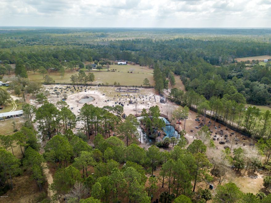 Great 11 acres high and dry and cleared. This property is ideal to build affordable homes, commercial warehouse etc. Elevation should be good as in the past, seller brought in numerous trucks of dirt. Great visibility off Highway 77.