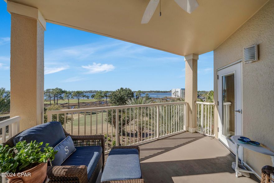 INCLUDED IN SALE 1 ASSIGNED COVERED DEEDED PARKING SPACE THAT IS A SHORT WALK TO ELEVATORS.  If you are searching for spectacular views of the Grand Lagoon, St Andrews Bay, the Pass to the Beautiful Gulf of Mexico, Shell Island, Heated Pool and Nicholas Golf Course this Bay Point Grand Residence balcony is hard to beat.  Come and enjoy a cup of coffee in the morning or a cocktail in the evening from the large balcony as you watch boats pass by.  Panoramic Water views from the Living Room, Dining Room, Kitchen and Both Bedrooms make this a condo to come and see for yourself.  Located in the pristine golf cart-friendly community of Bay Point which also offers at an additional cost a Nicklaus Golf Course, Tennis Courts and a Deep Water Marina that is closest to Gulf Water Access for boat enthusiasts.  You can also find on-site additional rental water sports activities and restaurant facilities.  Also, Bay Point features a newly completed full-service post office.  The golf course has breathtaking views of the Lagoon and Bay to enjoy while you're playing golf.  Grand Residences has wonderful amenities which include a workout exercise room, heated pool, community room, pool table and ping pong area, firepit, hot tub and grilling area.   Every unit at The Grand is equipped with a Halo Water System which is a system that utilizes wi-fi devices in all areas in the unit where water is present.  This unit comes with a nicely sized climate-controlled storage unit that is just a short walking distance away on the same floor. A split bedroom floor plan creates a private setting for family and guests with an additional den/office room for added convenience.  Some updates include newer ac, freshly painted interior, newer carpet in bedrooms and LVP in Den, some newer light fixtures....Grand Residence is No short-term rental allowed complex.  Make your appointment today!!!  More pictures to come.