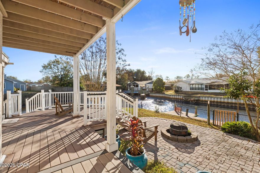 CURRENTLY UNDER CONTRACT, SELLER WILL CONSIDER BACKUP OFFERS. Experience the best of waterfront living in this spacious 3-bedroom, 2-bathroom townhome offering over 150 feet of water frontage with direct Gulf access. Fish from your backyard, enjoy peaceful water views, or keep your boat just steps from your back door—this home is designed for those who love life on the water.

The main level features updated luxury vinyl tile flooring, a cozy fireplace, and an open-concept kitchen equipped with granite countertops, stainless steel appliances, and a breakfast bar, making it ideal for both everyday living and entertaining. Step outside to a beautifully landscaped backyard and side yard, perfect for hosting guests or relaxing by the water.

Upstairs, you'll find three generously sized bedrooms, including a spacious primary suite with a private bath. Additional features include a 2-car garage, a metal roof installed in 2019, and leased solar panels that enhance energy efficiency.

Conveniently located near schools, shopping, dining, and daily necessities, this property offers a rare opportunity to enjoy Gulf-access waterfront living at an exceptional value.

Don't miss your chance to own this unique waterfront townhome