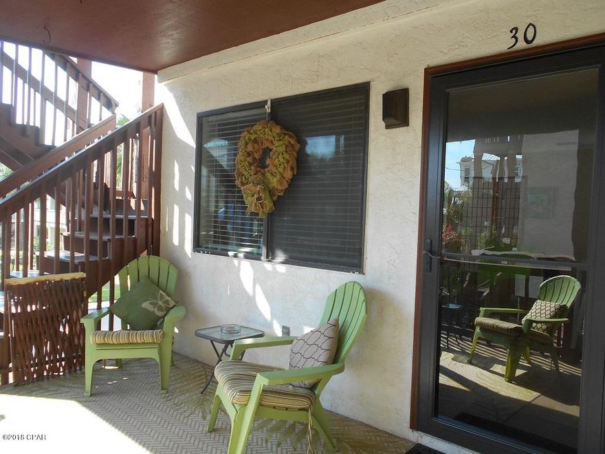 Updated efficiency, 1st fl. end unit, located half a block from the Gulf of Mexico. This unit is renovated through out with new AC (2018), water heater (2017),  flooring throughout & cabinets,appliances, freshly painted. Centrally located on Thomas drive close to shopping, restaurants, Rick Seltzer and Saint Andrews state park. All sizes approx., please verify.