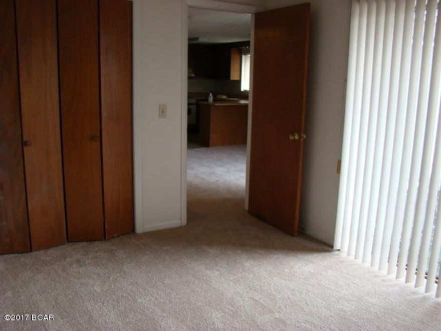 THIS HOME IS WALKING DISTANCE TO THE BEACH. LOCATED BETWEEN SOUTH LAGOON AND THE GULF. INCLUDES A PATIO AND OUTSIDE STORAGE ATTACHED TO THE HOME. OPEN FLOOR PLAN.  THIS HOME HAS ALL NEW CARPET. EASY TO SHOW