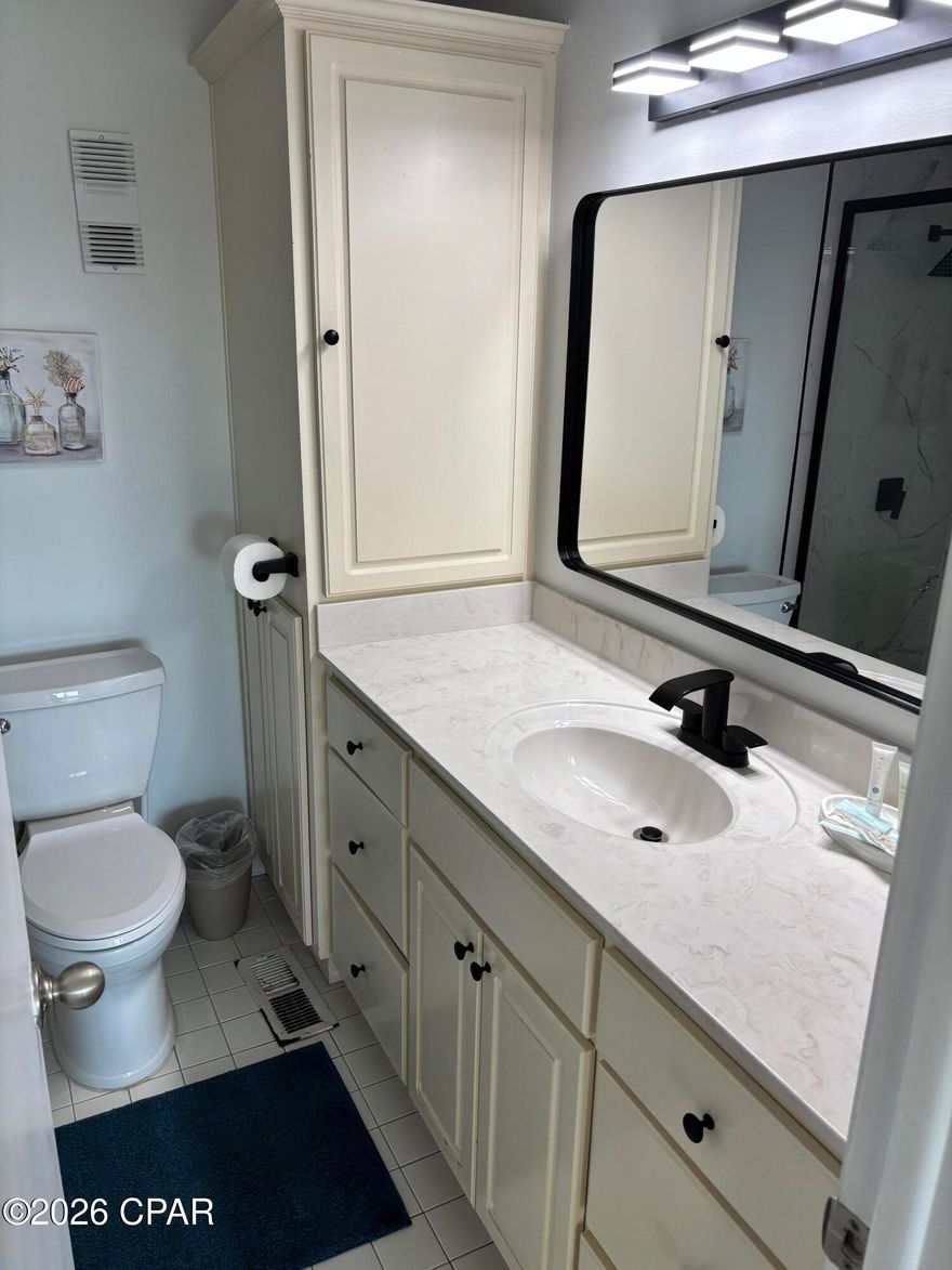 ***INVESTORS, TAKE NOTE...THE ONLY 4 BEDROOM, 3 BATHROOM FULLY FURNISHED GULF FRONT CONDOMINIUM ON PANAMA CITY BEACH UNDER $825,000 AS OF LIST DATE!!!*** The sellers have spared no expense in updating this spectacular money making unit(2025 $86,000+ gross rentals and over $95,000+ projected for 2026)in the recently renovated and gated Sugar Beach community that offers a community pool, clubhouse, tennis, pickleball,  and shuffleboard courts, and gated private beach access. Recent upgrades and updates include but are not limited to:$76,000 in assessments(fully paid that entail new unit windows, balcony doors and windows, unit entry steps, railings, doors, paint, new arcade, and much more), luxury unit LVP flooring, dining and living room furniture, toilet fixtures, water heater, complete unit repaint, renovated all 3 bathrooms, stainless steel refrigerator, new decor and accent mural bedroom walls and hallway. The community is situated perfectly, just minutes from St. Andrews State Park in one direction and Pier Park the other, as well as multiple music venues, restaurants, shopping, water sports, and both day and night life attractions. Hurry up and call me before this absolutely GORGEOUS unit gets away. All information is approximate and should be verifies by buyers if important.