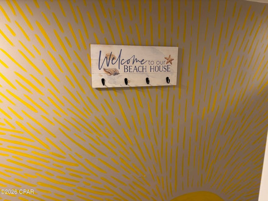 ***INVESTORS, TAKE NOTE...THE ONLY 4 BEDROOM, 3 BATHROOM FULLY FURNISHED GULF FRONT CONDOMINIUM ON PANAMA CITY BEACH UNDER $825,000 AS OF LIST DATE!!!*** The sellers have spared no expense in updating this spectacular money making unit(2025 $86,000+ gross rentals and over $95,000+ projected for 2026)in the recently renovated and gated Sugar Beach community that offers a community pool, clubhouse, tennis, pickleball,  and shuffleboard courts, and gated private beach access. Recent upgrades and updates include but are not limited to:$76,000 in assessments(fully paid that entail new unit windows, balcony doors and windows, unit entry steps, railings, doors, paint, new arcade, and much more), luxury unit LVP flooring, dining and living room furniture, toilet fixtures, water heater, complete unit repaint, renovated all 3 bathrooms, stainless steel refrigerator, new decor and accent mural bedroom walls and hallway. The community is situated perfectly, just minutes from St. Andrews State Park in one direction and Pier Park the other, as well as multiple music venues, restaurants, shopping, water sports, and both day and night life attractions. Hurry up and call me before this absolutely GORGEOUS unit gets away. All information is approximate and should be verifies by buyers if important.