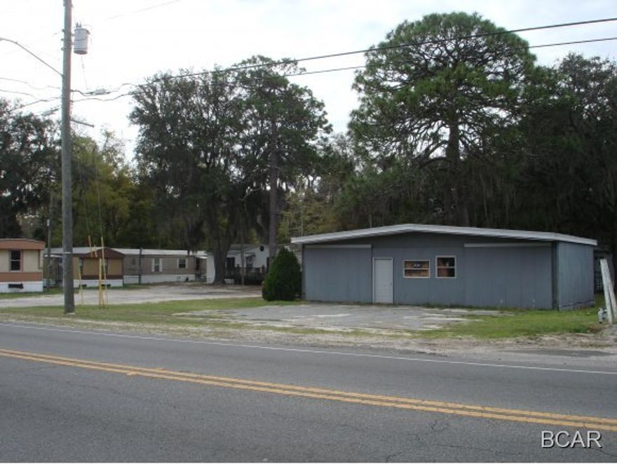 Excellent income opportunity with Highway frontage on Business Hwy 98 convenient to Tyndall.  The property include four occupied mobile homes and a storage building and all operating date and proforma is available.