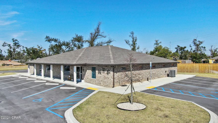 New Construction!  Beautiful Medical Office built in 2020 that is situated directly across the street from Ascension Sacred Heart!  The building itself consists of 4,800 SF and it is divided into two completely separate offices each with 2,400 SF., 24 parking spaces and two handicap spaces.  Built with a medical tenant in mind, the office features a spacious area for staff, a triage or records office, five exam rooms, two carpeted offices, a lab room, kitchen area with cabinetry and microwave, a laundry room with washer/dryer hook-ups, a tech room with Cat 6 cables for smart technology, as well as a spacious waiting room.   This space is turn-key and ready for occupancy!  This is a Triple NNNLease.