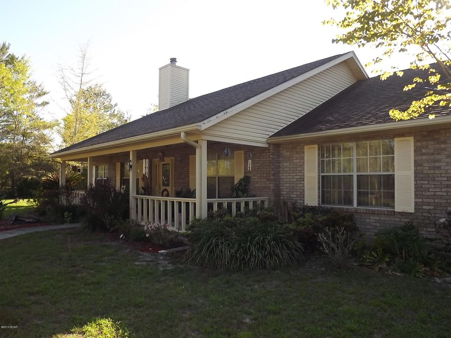 Welcome to Country Living, this a Beautiful 3Br/2Ba ranch style home on approximately 2 acres. The home is centered on the parcel and offers a nicely landscaped front yard with a mixture of natural growth trees and nicely blended flowering plants and vegetation. The back yard offers a yard arbor for enjoying those relaxing afternoons, early morning coffee or entertaining family and friends. This area could allow room for a garden or a swimming pool if desired. Also located in the back yard is a large Motor Home/Boat Barn and a nice work shop/shed which could allow for all types of projects and storage. The Interior of the Home Boast a beautiful updated and up graded kitchen, very warm and comfortable living spaces from the large Master Bedroom to the enclosed heated and cooled Florida Room From the freshly painted interior with warm and inviting colors to the rustic fire place this is one home you don't want to pass up on. The owner pride is readily apparent and shine through from this Beautiful well cared for home. Make your appointment to view this special property today.