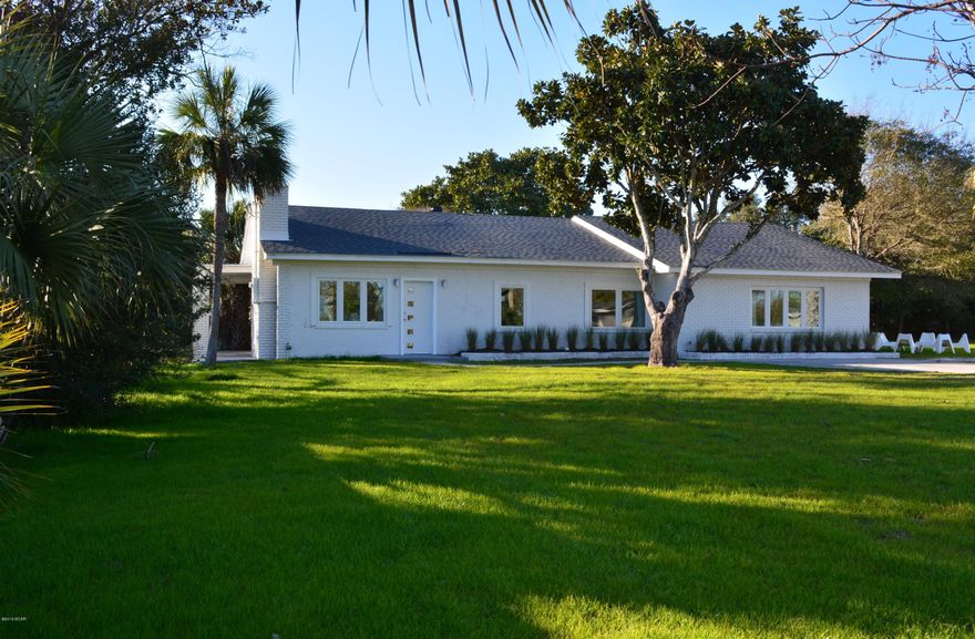 Be the first spend the night in this newly remodeled charming Old Florida cottage since its recent major makeover. 3 Bedroom 3 Bath with large bunk area that could easily be made into 4th bedroom. Sold furnished. Appox 2800 sf but owner is to verify such or accept actual sf'age as part of the offer. Recently remodeled. New Kitchen, interior and exterior paint, furniture, landscaping, AC and roof. Large open living area with fireplace PLUS a den. GREAT OLD FLORIDA COTTAGE FEEL. Large lot. 600ft walking distance to the sand! And you can see the beach from your driveway Public access at end of st.