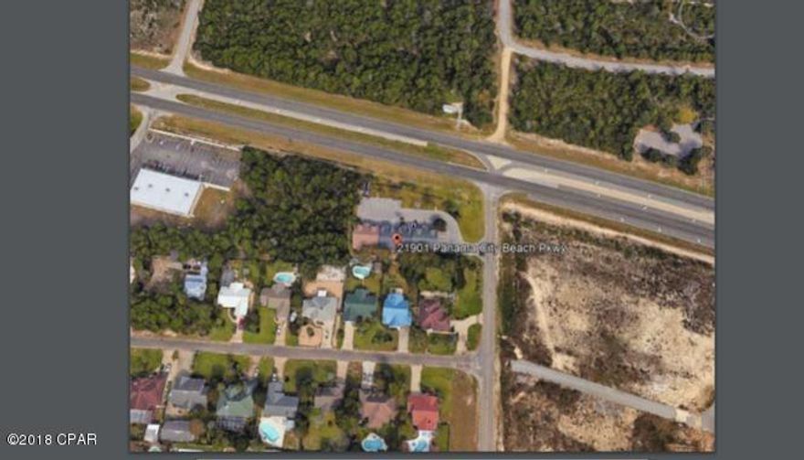 Property includes professional office buildings situated on a irregular .742 acre site.