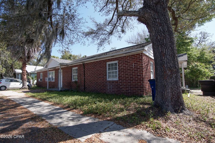 Remodeled 3-bedroom, 1-bath brick home featuring tile flooring throughout for easy maintenance and a clean, modern look. Cozy up by the fireplace in the inviting living area. Enjoy a spacious backyard, perfect for outdoor gatherings, pets, or gardening. Conveniently located near restaurants, grocery stores, and parks, offering both comfort and accessibility.