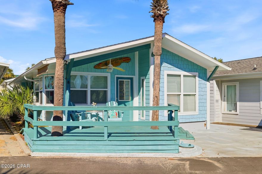 Located in the highly desirable Venture Out Resort, one of Panama City Beach's premier gated golf-cart communities with private beach access, this beautifully maintained home offers the perfect blend of comfort, convenience, and coastal charm.

Inside, you'll find a bright and open living, dining, and kitchen layout accented by coastal décor, durable vinyl plank flooring, and abundant natural light. The kitchen is well-appointed with stainless steel appliances, ample cabinetry, and generous counter space—ideal for both entertaining and everyday living.

The home features two spacious bedrooms and two full bathrooms, including a private primary suite. Both bedrooms are filled with natural light and offer a relaxing beach-house atmosphere throughout. This turnkey property is perfectly suited as a primary residence, second home, or income-producing vacation rental.

Step outside to enjoy the fantastic front porch, perfect for morning coffee or unwinding after a day at the beach. It's just a short golf-cart ride to Venture Out's private beach, pools, and resort-style amenities.

Venture Out is a gated waterfront community offering an incredible array of amenities, including two swimming pools (one heated seasonally), tennis and pickleball courts, shuffleboard and basketball courts, playground and picnic areas, a private boat ramp, marina, fishing pier, and 24/7 security.

Conveniently located just minutes from the World's Most Beautiful Beaches, as well as shopping, dining, and entertainment, this fully updated and furnished home is a rare opportunity in one of Panama City Beach's most sought-after communities. Don't miss your chance to own in Venture Out!
