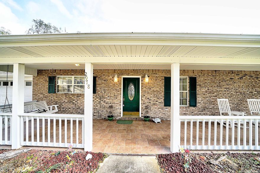 CURRENTLY UNDER CONTRACT, SELLER ACCEPTING BACKUP OFFERS. Beautiful 3 bedroom,2 bath brick home on Lake Dunford that withstood no major storm damage to property, and zero damages to home! When you walk into this spacious home, you immediately capture the beautiful lake views. This place is the definition of serenity. Bamboo wood floors throughout the living space with freshly shampooed carpet in all of the bedrooms. Spring-fed Dunford Lake is known for its extraordinary year-round fishing, whether you are in it for a record size Large Mouth Bass, or you would prefer to yank up Crappy, Brimm or Catfish one by one! 



Home has two driveways, both are plenty large enough for RV or large boat. Home also has power source for RV. Large 48' x 12' screened in patio on rear of house.