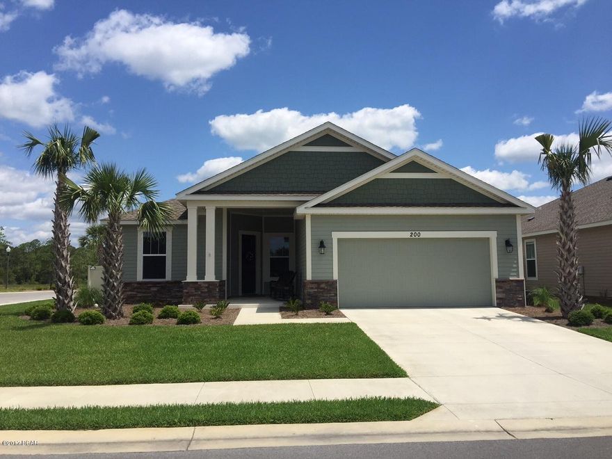 This home has a Pompano Floor Plan with a Coastal Elevation. This house is a new construction Model Home Example and not the actual house being built. A Samuel Taylor built home includes standard features such as designer carpet in main areas and bedrooms, 8 ft. 2 panel craftsman interior door package, brushed nickel fixtures and faucets throughout, insulated (R19) interior common walls and insulated (R38) ceilings, and durable Sherwin Williams premium interior wall paint. Kitchen features stainless steel appliance package (range, dishwasher, & microwave) and oversized 36'' wood cabinetry with crown molding, and granite counter tops. Full bathrooms include raised vanity heights, large tile flooring in bathrooms and laundry rooms, 2 x 6 Exterior Wall Construction, and hurricane tie down rod anchor system. Exterior of home includes coastal and craftsman architecture, spacious 2 car garage, architectural roof shingles with an extended warranty, low maintenance aluminum fascia and vinyl soffits, termite treated foundation, Hardi-Plank siding with an extended warranty, and durable Sherwin Williams Loxon exterior paint. All new construction homes are backed by a 2-10 Home Buyers Warranty. Your HOA dues includes lawn maintenance for the home. The Whisper Dunes subdivision includes sidewalks, curb & gutter, a beautiful community pool and pool cabana. Whisper Dunes is a golf cart friendly community and you are within a short driving distance to our beautiful beaches, Pier Park shopping, NW FL Beaches International Airport, and the beautiful 30A South Walton area. Choose your lot, floor plan & elevation, choose your design options, and pick your paint colors! All measurements and sizes are approximate, please measure for accuracy and verify all sizes.