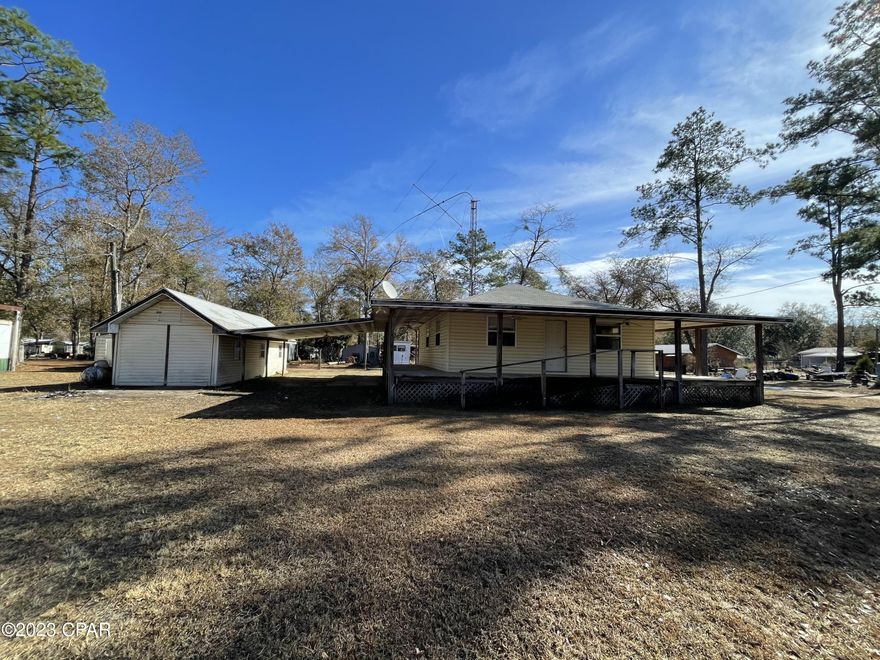 OWNER FINANCING AVAILABLE! Fishermen and hunters.....this is the one! Stick built in 2005 this hunt camp in Liberty county sits just minutes away from a public boat ramps and game lands. The summer kitchen located in the outbuilding is the perfect place to prepare your game or clean a fish. Located approximately 14 miles outside of Bristol city limits, where you'll find shopping and dining!
