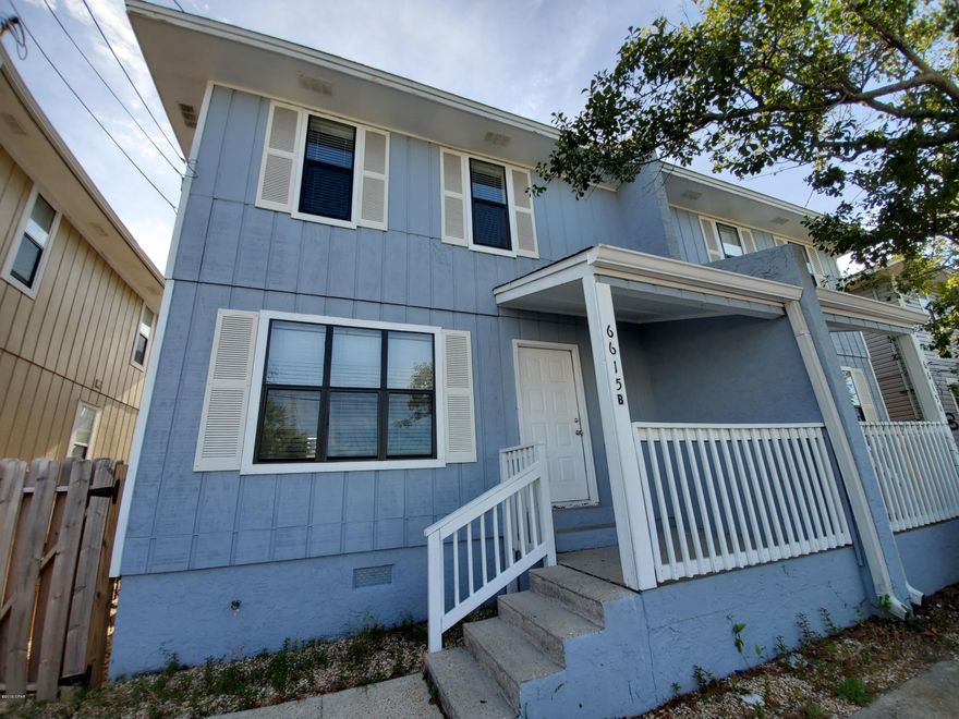 For rent! Unfurnished 3 BR/2 BA town home walking distance to the beach! 1st floor has living room, full bath, dining area, and kitchen with refrigerator, stove/oven, dishwasher. Covered patio and fenced yard! Upstairs are 3 bedrooms, 1 full bathroom, and a large back deck. Inside washer/dryer closet, outside storage closet; **Pets negotiable with $250 non-refundable pet fee.