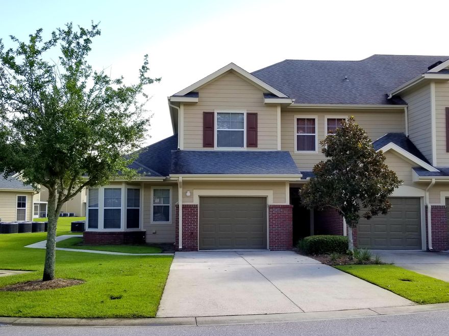 RARE OPPORTUNITY to own one of Baldwin Rowe's PREMIER floorplans! This unique model seldomly comes available, so act fast! Ideally located between Panama City & Lynn Haven, this well-maintained and IMMACULATE townhome is a must see! Having the largest floorplan in the gated development, this stunner has 3 BR, 2.5 BA, with the Master Suite DOWNSTAIRS. The interior features beautiful hardwood floors, granite tile counters, a fantastic eat in kitchen w/nook, & an open living & dining area. The home faces the community pond with gorgeous water fountains & provides a serene view as you enjoy your morning coffee or nightcap from the screened in back porch. Upgrades include Samsung stainless steel appliance suite and tile backsplash in kitchen, brand new carpet & padding, and fresh paint! Enjoy the gated community and pool without the upkeep! HOA takes care of lawn maintenance, pool, clubhouse, common areas, and tree trimming! You'll love this close-knit community & central location in Panama City! Less than a 5 min drive to shopping, hospitals, schools, and restaurants. Only 25 min drive to Tyndall AFB, NAS Panama City, and the beach! All measurements are approximate. Verify if important.