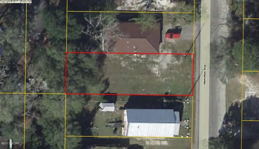Buildable Vacant lot. Zoned MU-2. Buyer should verify feasibility if important.