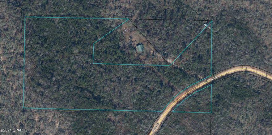 Looking for a getaway place in the country?  Well look no further.  18 acres with a running creek and old pole barn.  What else needs to be said.  Clear out what you need and leave the rest or clear it for horses or cattle. You decide.  Maybe build that camp or mansion or in between.  Mobile homes OK.