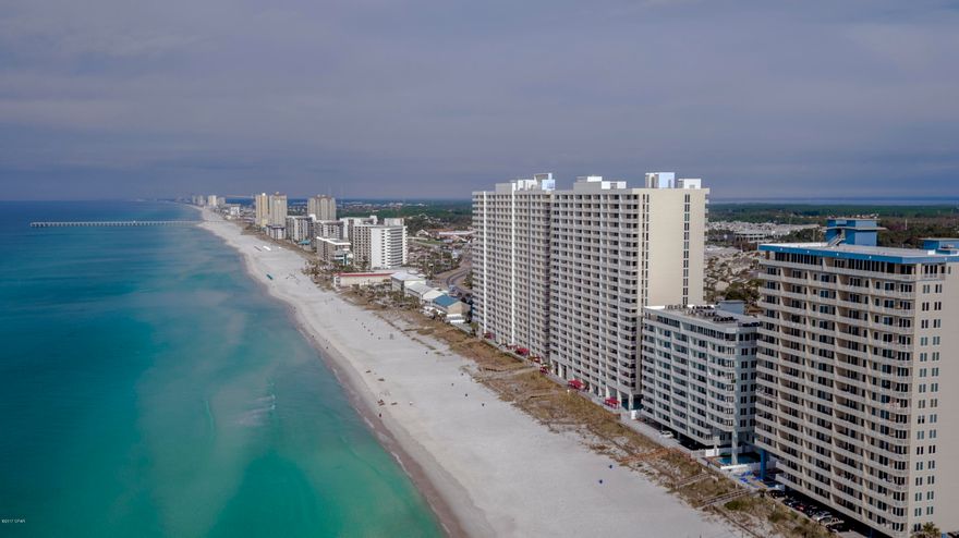 GULF FRONT, 3BR/2BA condo with fabulous sunset views. This is the condo that feels just like home!  Lots of sq footage. All tiled flooring, balcony tiled, stainless appliances, granite in kitchen & bathrooms, custom cabinets, pantry, crown molding, nice furniture, handicap accessible doors, extra large laundry room with owners closet. One of PCB's largest 3 BR condo floor plan's.  Marisol is a very  clean, low density complex & very quiet. High speed elevators, gym and pool.  Marisol went through a complete renovation the end of 2013 and looks fabulous!  VIRTUAL TOUR UNDER PHOTO TAB.