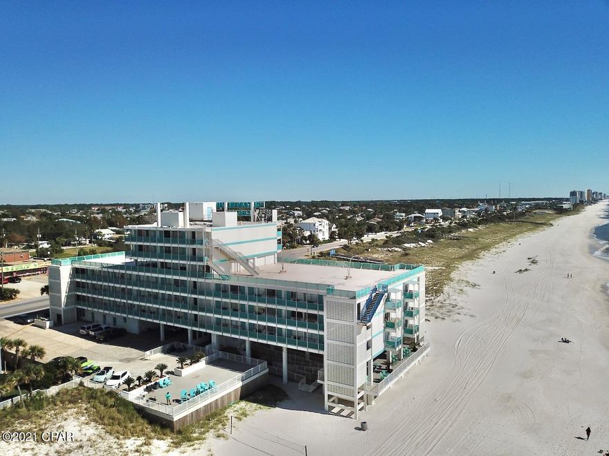 Purchase a beachfront condo for an affordable price. This beach front condo is centrally located to everything Panama City Beach has to offer. Popular dining, entertainment, shopping and steps to your own white sandy beach. When you're not spending the days on the beach enjoy the large pool or sit on the deck to take in the breathtaking sunsets. If you're looking for a beachfront primary residence or  investment property with the HOA fee covering all utilities Power, Cable, Wifi, Trash, Water & Sewer you don't want to miss out on this property.