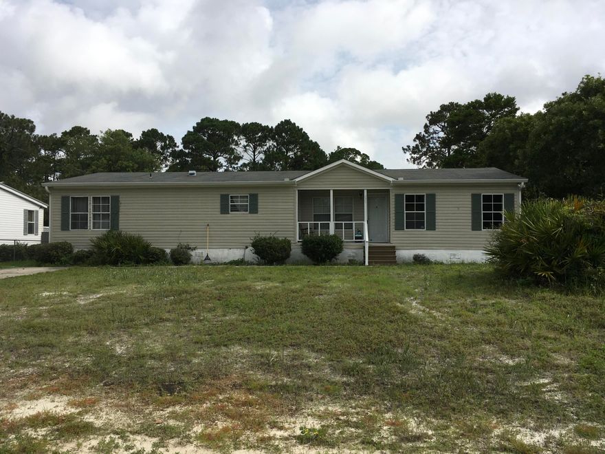 This 3bed, 2bath home is located in the highly coveted West end of Panama City Beach. It is just minutes away from the white sandy beaches or shopping and restaurants. The home has a band new septic tank, Hvac system, dining room flooring, paint and washer. There is a wonderful workshop in the backyard as well as a patio. The home is strapped onto the concrete runners and can withstand 145MPH winds. You will not want to miss this rare find!
