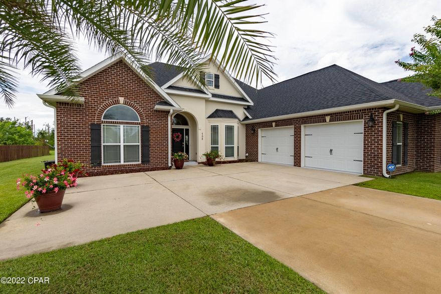 Stunning executive home, located in highly desirable Lynn Haven. This 4 bedroom 2 bath and 2 half baths, brick home is located on the beautiful Nature Walk Golf Course.  As you enter the home you will notice the open floor plan, leading into the family room and dining area.  The chef in the house will love this amazing kitchen which offers plenty of cabinet and counter space, granite counter tops, breakfast bar, a cozy nook for additional dining and stainless appliances. Home features a split floor plan, all generous size bedrooms. 4th bedroom is on the second floor and offers many options for it's use.  The house has a sunny Florida room which faces the golf course and even a pergola to expand your outdoor entertaining.  This one won't last long, call for your private showing today.  A All ages, sizes including sq. ft. are approximate measure if important.