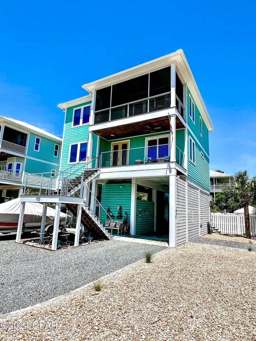 There are 1st tier luxury homes with unobstructed views of the Gulf of Mexico and then there is this turn key and fully furnished beachside gem! So many extras, we needed an amenities list. Completed in 2022 and never rented, this 4 Bedroom, 3 bath home was designed for entertaining and beachcombing. Delightfully appointed inside throughout with a nautical flair that flows to an outside pool, spa, and bar entertaining oasis. Built by one of the premiere builder in the area, Pepperfish Construction, the custom details inside and out are apparent in the details. GROUND LEVEL consists of; beautiful xeriscaped/ palm accented corner lot, 8+ parking spaces, double concrete and covered bays, one high enough for boat/RV storage, RV water and sewer hookup, 400 amp service, Generac for entire house, storage shed, and louvered trim. The heated pool and spa are large w 1200 sq ft of brick pavers, polywood furniture, 1000 gal in ground propane tank  1ST LEVEL consists of the master Ensuite that has a private access to a lovely balcony. Master bath has a double vanity with granite countertop, custom tile shower, and a walk-in closet. Across the way are two spacious bedrooms that are connected via a Jack and Jill bath that also has double vanity with granite countertop as well as a custom tile shower. Additional space consists of a beautiful foyer, balcony, laundry room, and elevator access. 2ND LEVEL is an entertainers delight with an open area that consists of a custom kitchen with a propane gourmet stove and range, custom cabinets with granite tops, large kitchen island/bar for extra seating. Separate dining area with seating for 6 as well as a beautiful custom trifold barn door pantry. A well appointed great room that empties onto a screened in balcony with stunning views of the Gulf of Mexico. A bonus bedroom/office and full bath with Tile shower and granite top vanity. Per owner; Salinas Park access for golf carts via the subdivision. Please see attached amenities list.