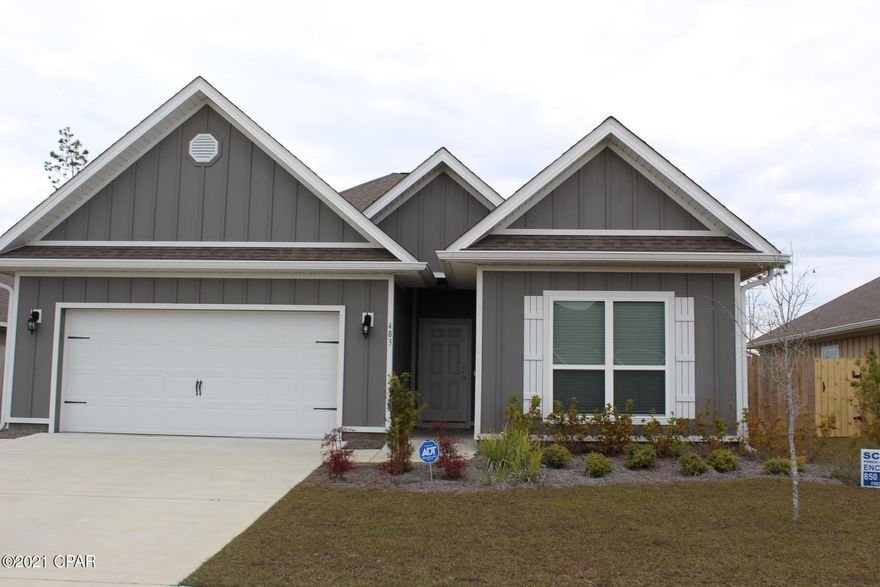 Rare find located in Bridge Harbor subdivision! This is Single family home, with attached but separated mother-in-law quarters complete with kitchen, bathroom,  and living area. It has it's own separate entrance.    The main home, has a open spacious split bedroom floorplan. Kitchen has granite countertops and island. Equipped with stainless steel dishwasher, microwave, smooth top range and refrigerator. Also washer & dryer with both the home & the mother-in-laws quarters.  Luxury vinyl plank flooring and carpet in the bedrooms. The Master bath has a separate shower and tub, double sink vanity and walk-in closet. Screen back porched, privacy fenced backyard.  This home is convenient to Tyndall AFB, shopping, schools, and the beaches.