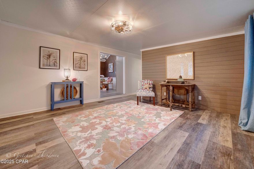 $5K PRICE REDUCTION for this great LOCATION >> right across from the back pool.  And did I mention GORGEOUS?  Just renovated and beautiful.  All new kitchen, possibly the largest in Emerald Pointe.  New cabinets, new frig, other appliances like new:  double oven, dishwasher & microwave; all SS.  New flooring throughout.  Tongue and groove pine on the ceiling.  Shiplap in LR and Guest Bedroom.  Large master.  Walk-in showers in both baths.  Extra Laundry Room with desk for those pesky business calls while at the beach!!!!  Lavish 25ft screened-in porch right across from the pool and a large carport.  This home is so spacious it's perfect for your full-time home at the beach.  If you can only be in paradise part-time, it's perfect for that too.  And if you are looking for an investment, you will have many return guests to this home.  Emerald Pointe is a unique gated community convenient to everything on the beach:  restaurants, shopping, groceries and of course, the beach itself.  You will love the real sense of community here with 2 neighborhood pools, one with a hot tub, exercise room, shuffleboard court, a large pond with a solar-lite boardwalk all around, dog-walking areas, and a large clubhouse with many activities for all.  HOA fee includes water, sewer, trash, cable & lawn service.  All measurements approximate.  Please re-measure if important.