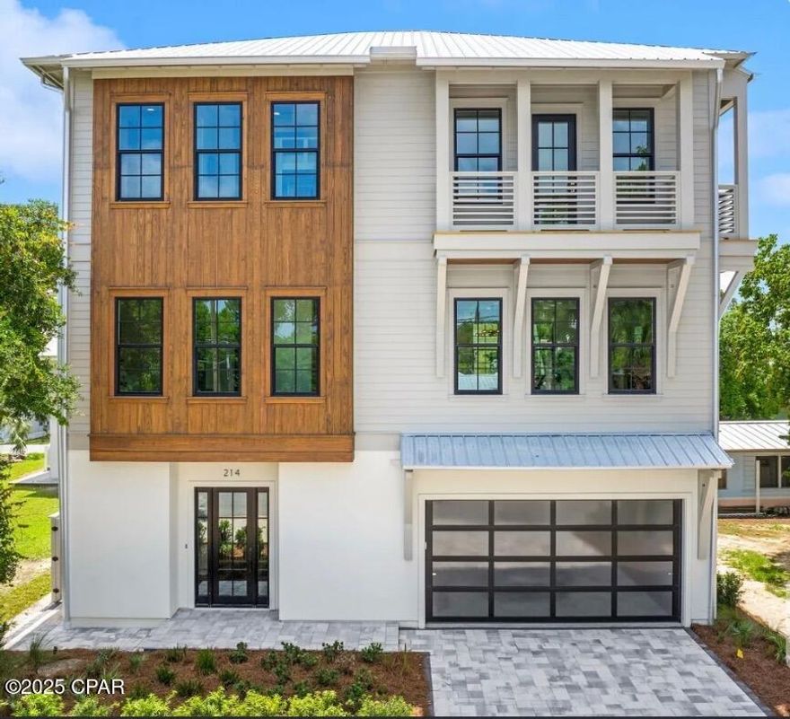 Unlock the potential of coastal real estate with 214 Toledo Place in Panama City Beach, FL, Laguna Beach. This property presents a lucrative investment opportunity, offering a blend of luxury amenities, prime location, and energy efficiency. With 3245 sq ft of heated/cooled space, this 3-story home features 5 bedrooms and 5 full bathrooms. Its close proximity to public beach access ensures high demand for short-term rentals, making it an attractive prospect for investors. Each aspect of this property has been carefully designed to maximize returns. From the balconies with water views to the oversized covered outdoor kitchen/entertaining space, every detail caters to the desires of vacationers seeking the ultimate coastal getaway. The outdoor kitchen is equipped with a 38'' built-in grill, outdoor ducted hood, ice-maker, mini-fridge, and sink, providing the perfect setting for al fresco dining and entertaining. Inside, premium features such as 10' ceilings, PGT Impact windows/doors, Carrera Marble tile, and Quartz countertops elevate the property's appeal, commanding premium rental rates. Energy efficiency is integrated into the construction with 2x6 framing, R-19 insulation, and a spray foamed roof deck, ensuring lower utility costs and a smaller environmental footprint. Custom touches, including 8' solid wood interior doors, wooden closet shelving, and low-profile mud-in HVAC grills, add a touch of luxury, while safety and convenience are ensured with a sprinkler/fire alarm system (short-term rental requirements) and a 2-car garage. For added convenience, the property boasts laundry rooms on both the 1st and 3rd floors, making it exceptionally practical for guests and maximizing rental appeal. For savvy investors, the inclusion of natural gas appliances (natural gas on-demand tankless water heater, natural gas 36'' kitchen range, natural gas 38'' built-in outdoor grill, natural gas pool heater), including a heated saltwater pool and outdoor shower, not only enhances the property's attractiveness but also reduces long-term operational costs. Fully furnished and move-in ready, this property offers immediate income potential.