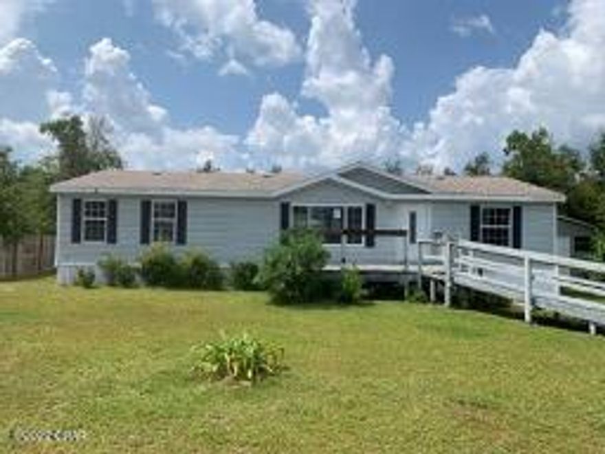 Open to INVESTORS! Here is a great opportunity for a person who is handy.  This is a 3 bedroom, 2 bath on almost 1/2 acre.  Split bedroom plan with an open floorplan for kitchen and living areas.  Located on a paved road in a quiet neighborhood, away from the busy crowds.    (All info is approximate. Buyer to verify ANY information that is important. NO REPAIRS may be done prior to closing by buyer or seller.)