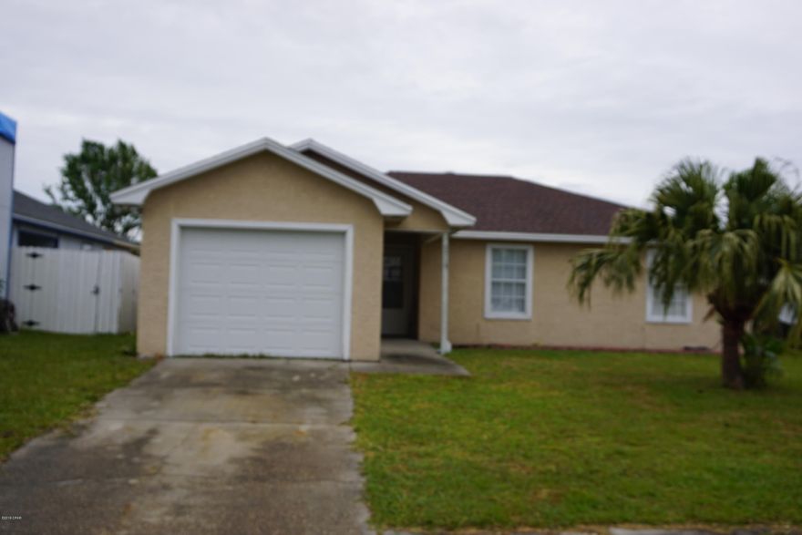 This home is move-in ready with new roof completed on 3/28/19. This open floor plan with 3 bedrooms 2 bath with garage offers fire place & tile flooring in living area, open kitchen with dining area and carpet in bedrooms. Home had minor hurricane damage and has been repaired. Also Ac & heat was replaced in 2015. Call for more information or a tour. If important all measurements should be verified.