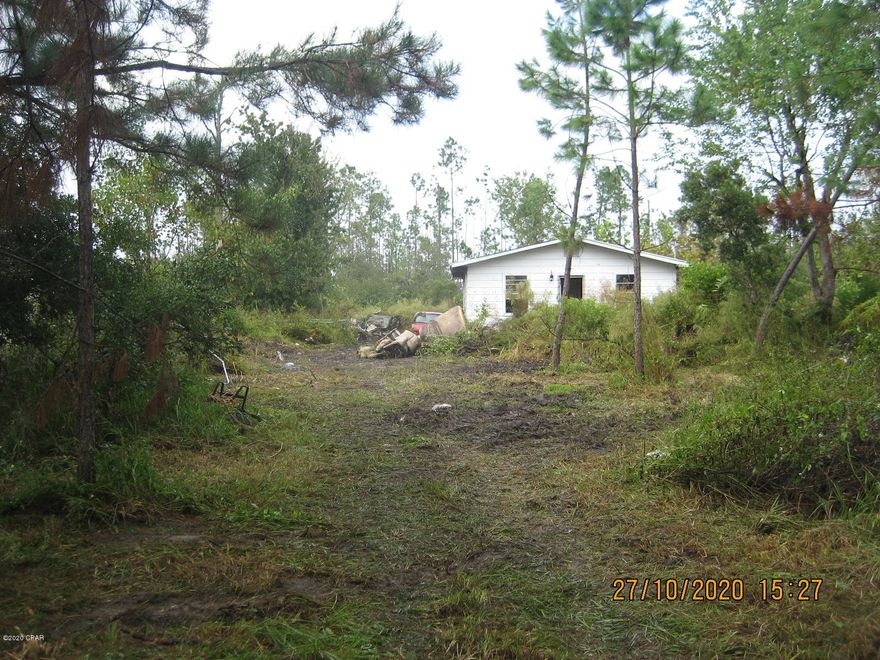 Nice 2 acre parcel on paved road just off of Hwy. 231.  Property has a dilapidated older home on it given no value.  Has a well and septic tank but not warranted by seller. 

 Private acreage near town.  Priced right.  Appears to be zoned R-2 duplex/manufactured housing.  Make offer!  Owner will finance with $6,500 down, at 8.5%, 10 years.

 All information is taken from Public Records.  Anything important to Buyer should be verified.