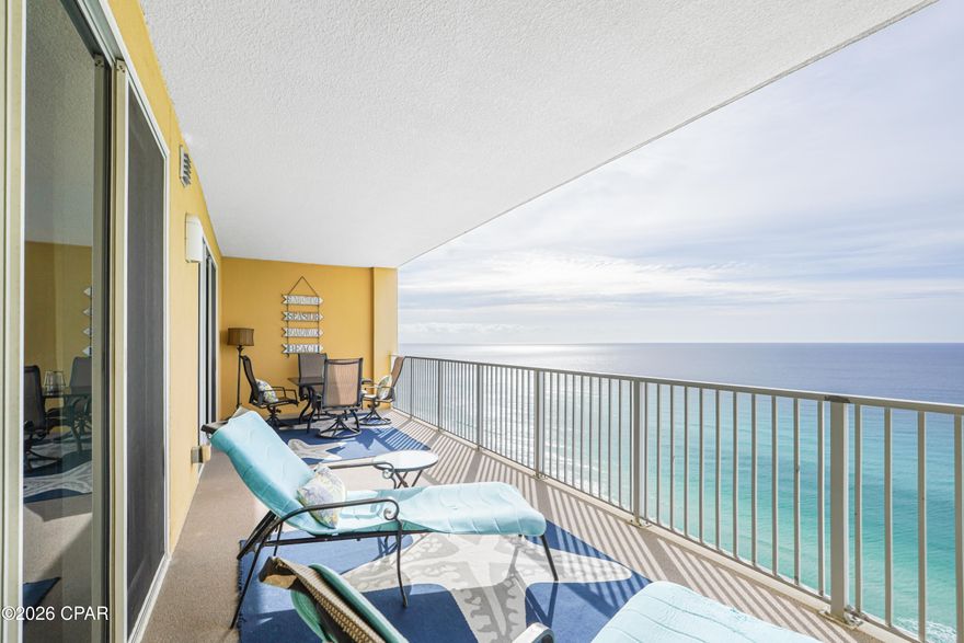 Experience the quiet side of Panama City Beach at Tropic Winds, perfectly positioned on the desirable west end of the beach. This is one of the final high-rise buildings before the secluded stretch of Bay County and into Walton County, offering expansive, uncrowded shorelines even during the height of the vacation season. Enjoy the perfect balance of seclusion and accessibility—just 2.5 miles from Pier Park, ten minutes from the upscale dining of 30A, and twenty minutes from the airport.

This two-bedroom, two-bathroom residence is in turnkey, immaculate condition. Having never been used as a rental, the home has been meticulously preserved by only two owners as a private second home. Recent updates offer peace of mind, with both the HVAC and water heater replaced in 2021.

The interior features elevated ceilings and a thoughtful floor plan that feels remarkably spacious. The kitchen is fully equipped with stainless steel appliances, a breakfast bar and a kitchen sink with a beach view! Ceramic tile flooring throughout the main living areas and extra-thick, premium carpet (installed 2019) in like-new condition in the bedrooms. The dedicated walk-in laundry room is a rarity in a condo, and has been stylishly updated with a custom barn door, cabinetry, and high-end front-loading washer and dryer.

The master suite serves as a private retreat, featuring black-out curtains for restful mornings and a private en-suite bathroom with a custom-tiled walk-in shower. Step directly from the master bedroom onto the massive 10' x 28' balcony, an expansive outdoor living space perfect for dining while overlooking the emerald waters. The guest bedroom is equally impressive, large enough to accommodate a triple bunk plus a full-size bed, with easy access to an updated full bathroom with a walk-in tiled shower.

Tropic Winds enhances your coastal lifestyle with an indoor/outdoor beachfront pool, hot tub, sauna and steam room, fitness center, and even a dedicated dog park. For the buyer seeking a move-in or rental ready property that combines modern reliability with high-end finishes, this residence is ready for you!