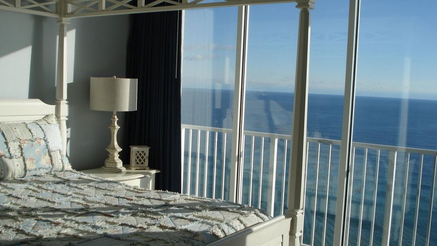 Dont miss this beautiful 2 bdr/2 bath condo with bunk room in one of the most upscale resorts in Panama City Beach! This condo was selected by and featured on HGTV's Beachfront Bargain Hunt! You will be impressed with the cottage chic & beachy decor and the light and bright furniture and appointments. Gorgeous emerald water views from the 21st floor are panoramic looking through the 9' tall floor to ceiling windows in both the living room and spacious master bedroom. Upscale amenities include a beautiful pool, kids play area, tiki bar, hot tub, and gorgeous owner's lounge.  Beautiful appointments grace the common areas and will impress even the most discriminating buyer! Gated 24 hour security is on site as well as plenty of open parking. Don't miss out on this gorgeous beachfront condo!