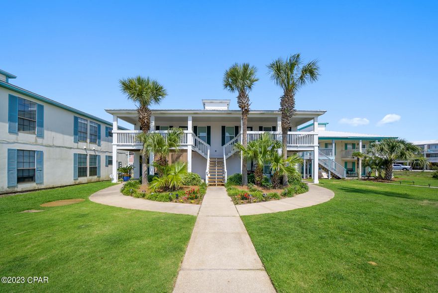 Bring your suitcase and your bathing suit! This adorable 2/2 condo is less than a block from the beach and comes fully furnished. Flooring is tile and LVP throughout, no carpet to worry about. This second floor unit also has brand new energy efficient windows throughout and washer and dryer is included. Convenient west end of Panama City Beach location, just a few miles away from all the great shops and amenities of Hwy 30A!
Utilities included  in rent are water, trash, and lawn care. Call today for a showing!
Please note linens and small personal items will not convey and are for the purposes of staging only. Tenant will need to provide bed linens.