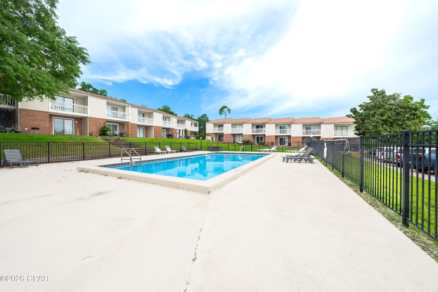 Welcome to Landings at Lake Caroline, Unit C-6 is a well-priced condo offering comfort, potential, and a peaceful setting. This charming two-story unit features a functional layout with a spacious living area, kitchen, and half bath on the main floor, along with two bedrooms and a full bath upstairs. The primary bedroom includes its own private balcony, perfect for enjoying a bit of fresh air.

With room for updates, this property presents a great opportunity to personalize and add value over time. The HOA covers exterior maintenance, pest control, lawn care, and access to the community pool, making for easy, low-maintenance living.

Tucked away in a quiet area with minimal traffic, yet conveniently located just a short drive from downtown Panama City, you'll have quick access to local eats, shopping, and entertainment while still enjoying a relaxed, laid-back atmosphere.