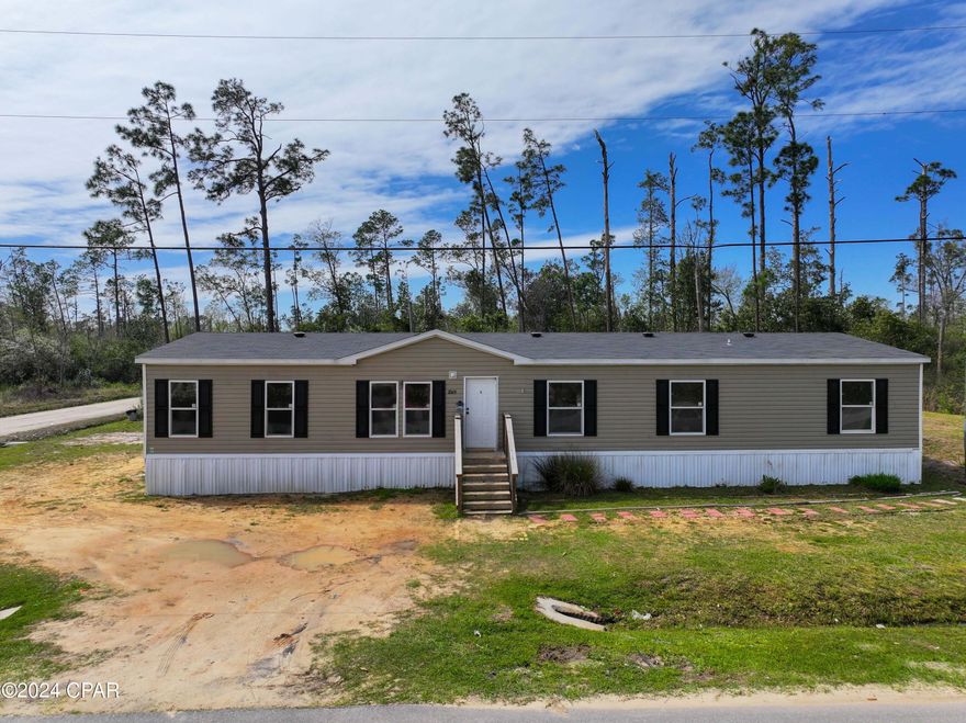 CURRENTLY UNDER CONTRACT, SELLER WILL CONSIDER BACK UP OFFERS. Spacious 5 Bedroom/3 Bath manufactured double-wide built in 2020 is now available in Fountain, FL. Home is perfect for either a large family or someone looking for plenty of space for home offices, craft rooms, etc. Large Master Bedroom is separate from other bedrooms in this split floor plan. House also boasts a 15' x 14' Family Room. House sits on a corner lot.