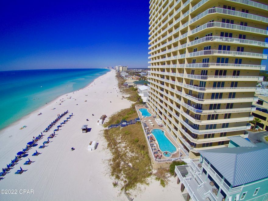 CURRENTLY UNDER CONTRACT, SELLER ACCEPTING BACKUP OFFERS.  Fabulous Seychelles condo on the much preferred 6th floor!  This 1BR/2BA with bunks has been completely renovated and is beautifully furnished and decorated.  Upgrades include new Kitchen cabinets with quartz countertops and tile backsplash, stainless appliances, gorgeous luxury plank vinyl flooring throughout, and the AC was replaced in 2019.  Of course we'd be remiss not to mention the fantastic view of the Gulf of Mexico from the private balcony!  Also, the HOA fee 

HOA fee includes electricity, just one of few on the beach that do!  This is a great rental unit and the property has two gulf-side pools, a covered parking garage with walkover for safety, fitness center, and you're walking distance to several restaurants and a  short drive to St Andrews State Park.  Great rental income.  Per sellers, gross income in 2021 was approx. $45k.  ALL information is approx and BUYERS must verify if important.