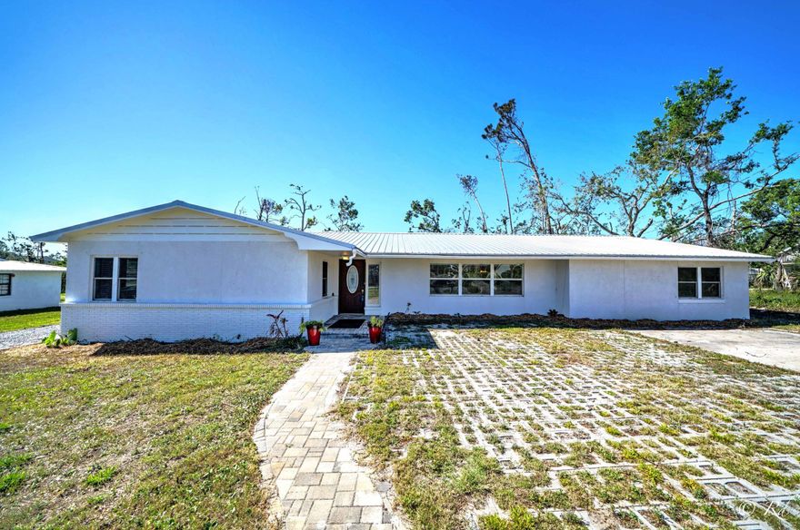 Currently Under Contract, Seller accepting Back up offers.     1103 W 11th Court, Panama City, FL 32401 is a very large 4 bedroom 2 and half bath home with a small in ground pool.  On a third of an acre just minutes from downtown, parks, and St. Andrews Bay.      With a metal  roof, fresh paint and a modern kitchen this home is ready to move in.  Seller is still working on some small repairs in the yard.  You won't find this much square footage in the center of town for a lower price.  Fireplace in the family room and a split floor plan.     Room sizes should be confirmed if they are important.  Dimensions from public record. Refrigerator is excluded from sale.