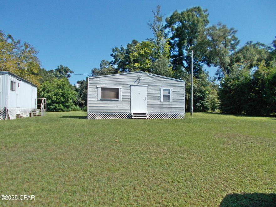 There are 3 buildings on this parcel is presently being used for an office, It would make an Ideal Barber shop, office, car lot, nail shop, so much potential, it's like being on Hwy 90 without the traffic. 3 buildings have Elec, one has a bathroom also. Priced to sell.