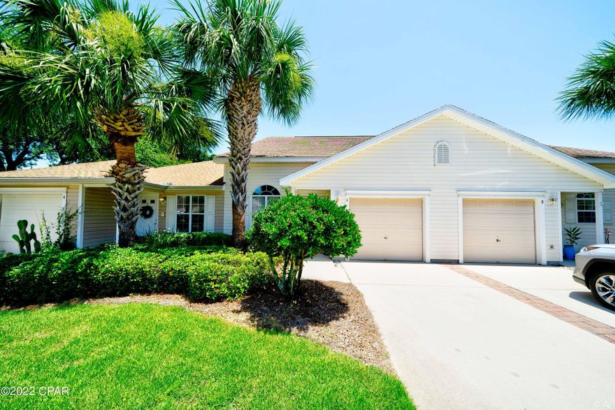 'CURRENTLY UNDER CONTRACT, SELLER ACCEPTING BACKUP OFFERS' Beautiful 3 bed, 2.5 bath townhome with a loft in the desirable Palmetto Trace community! This home features an open living room, kitchen and dining area that is perfect for hosting family and friends. The kitchen is equipped with stainless appliances, white cabinets, a large pantry, a breakfast bar and recessed lighting. Sliding glass doors off the dining area leads to a screened-in back patio and the backyard. The primary bedroom is situated on the first floor and features a private ensuite. The primary bathroom features a private toilet room with a shower/tub combo with a jetted tub that is separate from the vanity. There is also a half-bath downstairs for the ultimate convenience. The two additional bedrooms are located upstairs and share a full bathroom with a shower/tub with Jack & Jill style doors. There is also a loft upstairs that is perfect for an office, play area or sitting area! This home features attic space for extra storage with a pull-down ladder as well as a 1-car garage. This home is also located near the pool, making it a breeze to cool off in the summer! Palmetto Trace features 2 pools and golf carts are allowed. This home is just a short drive to Pier Park, the sandy white beaches and the desirable 30A. Check out this home today!