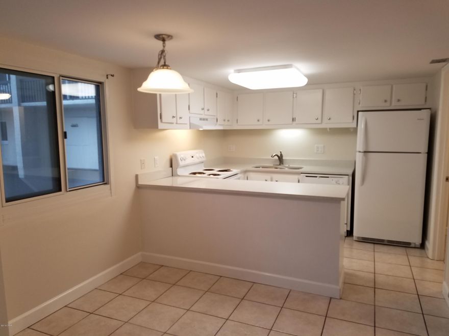 Located on the very desirable west end of Panama City Beach. Pinnacle Port complex is surround by the Gulf of Mexico and Lake Powell. This two level unit features 2 bedrooms and 2.5 bathrooms. Beach views are available from the living area balcony and Lake views are available from the master bedroom balcony. Complex amenities include gated entry, two swimming pools, sauna/steam room, fitness room, lighted tennis courts, shuffleboard, and freshwater dock with kayak launch.