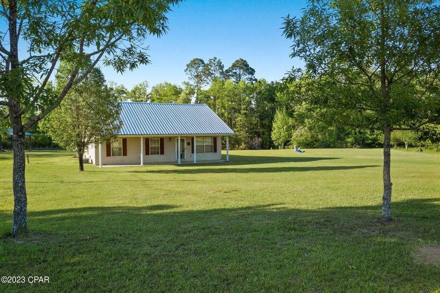 WELCOME TO COUNTRY LIVING!!!  This cute & cozy 2 bed/ 2 bath home is move-in ready and waiting for you! Home has been newly painted and offers a large living room, open kitchen/ dining room and Oversized master bedroom with ensuite bathroom.  Outside features a screened in patio off the kitchen/dining area perfect for entertaining or family cook outs.  BONUS:  Large pole barn and pond access make a great addition to this property! Home would be a perfect starter or retirement home.  Don't miss this one, call today to schedule your personal viewing!!

**When viewing, please stay off the flagged areas.  Septic system and drain lines are located on West side of home.**