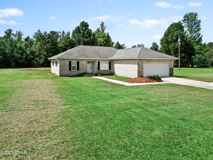 !!CURRENTLY UNDER CONTRACT, SELLER WILL CONSIDER BACKUP OFFERS!!

Welcome to 19087 SW Barfield Rd in Blountstown, FL - a place where comfort, space, and country living come together. Built in 2001, this 3-bedroom, 2-bath brick home offers 1,623 sq ft of well-planned living space on approximately 2 acres, giving you room to breathe and enjoy life. A 2019 roof, 2019 hurricane-rated windows, and a 2020 AC system add peace of mind and lasting value.

Step inside and you're greeted by an open-concept layout that connects the dining room, kitchen, and family room—perfect for everyday living and entertaining. A large picture window in the dining area frames a peaceful front yard view, while the kitchen is equipped with a range/oven, range hood, refrigerator with ice maker, microwave, and dishwasher. Ceramic tile flooring flows through the kitchen and dining area, while the family room features laminate plank flooring for a warm, inviting feel.

The split-bedroom floor plan provides privacy, with two bedrooms and a full bath on one side, and a spacious master suite on the other—complete with a walk-in closet and en-suite bath featuring dual vanities, a soaking tub/shower combination.

Enjoy the outdoors from your covered back porch, or take advantage of the property's pole barn for hobbies, storage, or projects. Additional features include recessed lighting, a tankless water heater, well tank located in the garage for protection, and a generator hookup.

Located just about an hour from Panama City, Mexico Beach, and Dothan, AL, this home offers a perfect balance of country living with easy access to the coast and nearby towns.

Schedule your showing today and see how this property can be the perfect fit for your lifestyle!