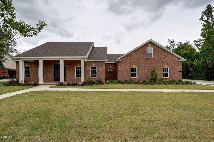 NEW CONSTRUCTION ON LARGE CORNER LOT IN LYNN HAVEN! THIS CUSTOM HOME IS A MUST SEE. INTERIOR FEATURES INCLUDE LARGE LIVING ROOM WITH WALNUT HARDWOOD FLOORS, CUSTON BUILT IN BOOKSHELF, COFFERED CEILING AND PATIO ACCESS, THE KITCHEN IS OPEN TO THE LIVING ROOM AND IS ANY COOKS DELIGHT! IT FEATURES AN ABUNANCE OF CUSTOM CABINETS, QUARTZ COUNTERTOPS, BREAKFAST BAR, STAINLESS APPLIANCES(SIDE BY SIDE KITCHENAID REFRIDGERATOR, GAS COOKTOP,DISHWASHER, ICEMAKER, AND OVEN WITH MICROWAVE/CONVECTION.)LARGE FORMAL DINING ROOM WITH COFFERED CELING,LARGE TRANSOM WINDOW AND WALNUT HARDOOD  FLOORS. THE MASTER BEDROOM IS SPLIT FROM THE ADDITIONAL BEDROOMS IT IS COMPLETE WITH WALNUT HARDWOOD FLOORS, CUSTOM CLOSET,PEBBLE BOTTOM SHOWER WITH RAIN SHOWER, SEPARATE SOAKING TUB AND HIS AND HER VANITIES WITH QUARTZ COUNTERTOPS.  THE ADDITIONAL DOWNSTAIRS BEDROOMS ARE A GREAT SIZE AND OFFER LARGE CLOSETS.  THE UPSTAIRS HAS A LARGE BEDROOM WITH A LARGE WALK IN CLOSET AND BATHROOM.  THEIR ARE MANY OPTIONS FOR THIS GREAT SPACE.  ADDITIONAL INTERIOR UPGRADES INCLUDE, PRE WIRED FOR SURROUND SOUND, PREWIRED FOR SECURITY SYSTEM, UPGRADED LIGHT FIXTURES, BUILT INS IN MUDROOM AND MUCH MORE.EXTERIOR FEATURES INCLUDE ALL BRICK, OVERSIZED GARAGE WITH 2ND WASHER DRYER HOOK UP, ENTIRE HOME GAS GENERATOR, INFINITY SERIES AIRCONDITIONS SYSTEMS WITH 3 ZONES, SPRAY FOAM INSULATION, PREWIRED FOR POOL AND OR SHOP, NO DETAIL OVERLOOKED IN THIS ONE OF A KIND CUSTOM HOME. CALL TODAY FOR YOUR OWN PRIVATE SHOWING APPT.