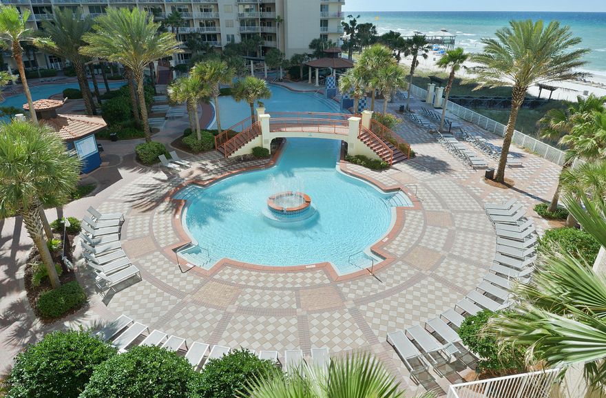 Low floor FABULOUS beach getaway at the ever popular Shores of Panama! Property convey's with 4th floor dedicated Parking Space. This beautifully decorated, 2 bedroom + bunks, 3 bath Gulf front condo is fully equipped and ready to rent! Easily sleeps 8. This Mediterranean style resort was designed with the beach and sun in mind as you enjoy warm gulf breezes from the balcony as you are admiring the amazing Gulf views. The gourmet kitchen features loads of cabinet space and is fully stocked and ready to go. Outside Shores of Panama offers resort style amenities including 13,966 SF Gulf side lagoon pool and hot tub, large heated indoor pool & hot tub, health and fitness center, spa, sauna, massage therapy and steam room, 2 tiki beach bar and grills serving food and drinks, Kids Club activity , meeting spaces and covered on-site parking. So don't miss the opportunity to own your own little piece of resort style living!  All dimensions are approximate and should be verified if important.