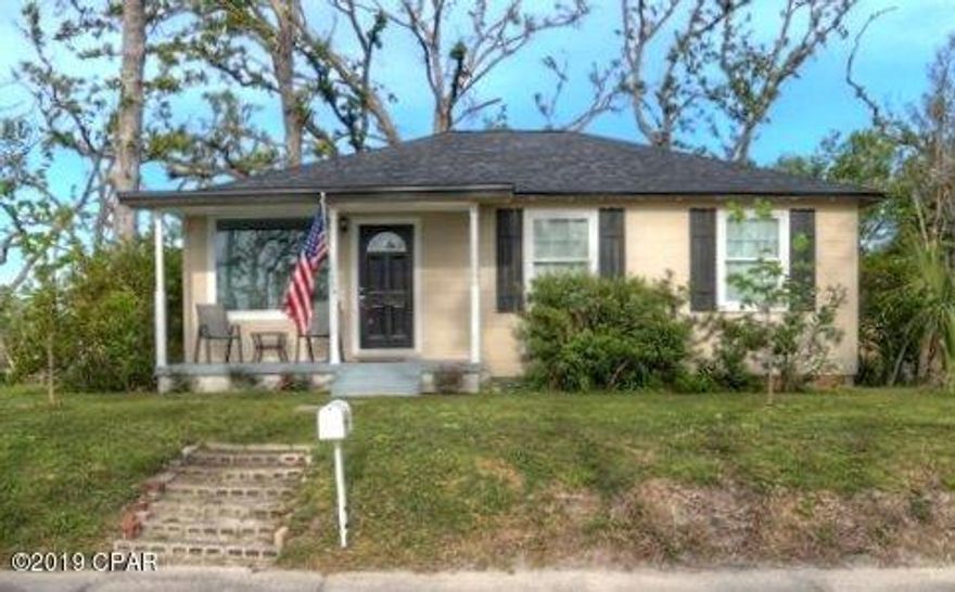 Lovely Cove home located on a high, dry corner lot.   Numerous upgrades have been completed in this move in ready house!  Upgrades include new windows, refinished original 1943 Oak flooring, tankless water heater (natural gas), kitchen with granite countertops, new insulation, new roof (warranty conveys) and interior paint.  Some of the furnishings and window coverings convey with sale.  A current survey is available.  Seller is a Realtor.