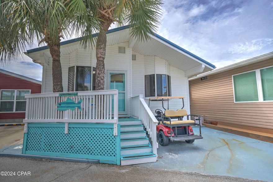 CURRENTLY UNDER CONTRACT, SELLER WILL CONSIDER BACKUP OFFERS - Calling all beach lovers!! Check out this stunning 3-bedroom 2 bath home and as a bonus you will find extra parking spots behind the home, making parking a breeze and access to the home and beach super easy!   Roof is 2019, new stovetop and stunning new bathroom vanities have recently been added.  This home has a fantastic open floor plan, large bedrooms and flows beautifully.   This home would be an outstanding investment opportunity or make this your second home.  Venture Out is a golf cart community that has exploded with popularity recently... With 300' on the beautiful pristine beaches of the Gulf of Mexico and 1,000' on the Grand Lagoon. Venture Out has something for everyone. With 2 pools, fishing pier, boat dock and much, much​​‌​​​​‌​‌​​​​‌​​‌​​​​‌‌ more!