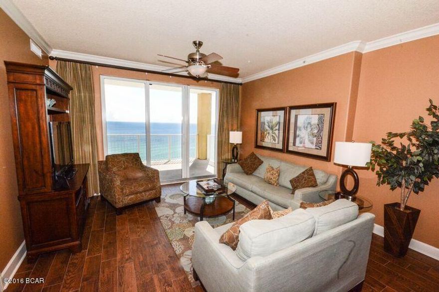 13th Floor West End Penthouse loaded with upgrades at Tropic Winds! Boasting a spacious 2 bedroom floor plan with the main living area and the Master Bedroom opening onto an expansive 10'x28' balcony, this Platinum rated condo enjoys incredible panoramic gulf views, low HOA dues, an assigned covered parking space close to the elevator and a prime West end location.

Upgrades include Stainless Steel kitchen appliances, tile kitchen backsplash, tile plank flooring and a like new Samsung Washer and Dryer. Offered Turn Key with 6 years of strong rental history.